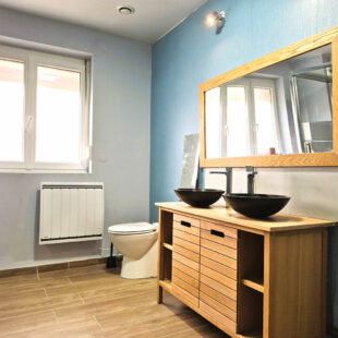 Maison semi-individuelle de type Bâtir avec garage