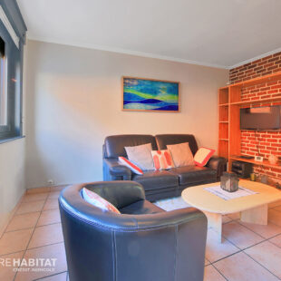 Maison 110 m² et garage.