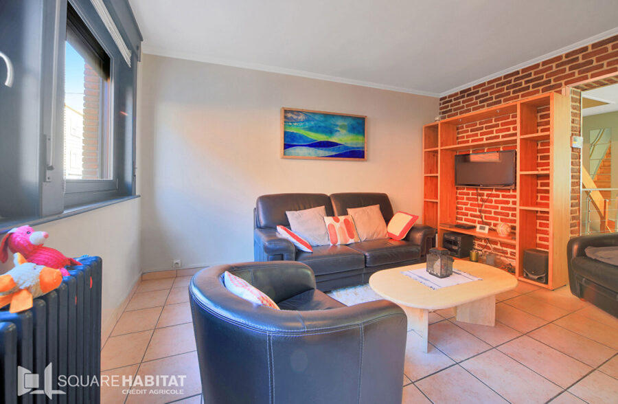 Maison 110 m² et garage.