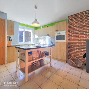 Maison 110 m² et garage.