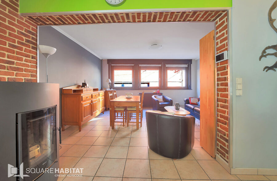 Maison 110 m² et garage.