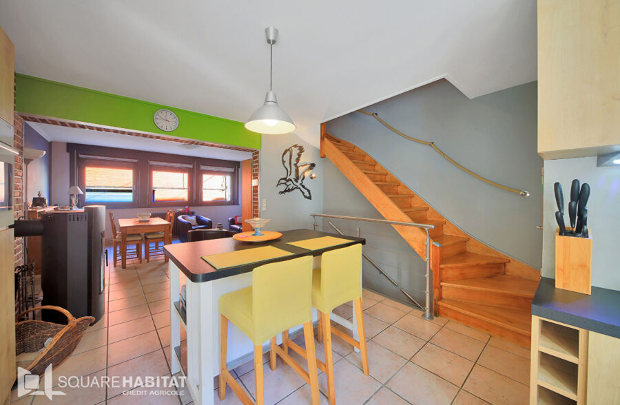 Maison 110 m² et garage.