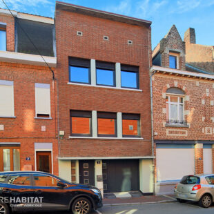 Maison 110 m² et garage.