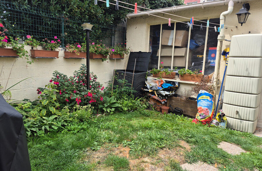 Très jolie maison 1930 en centre ville, 3 chambres, jardin, garage.