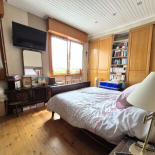 Très jolie maison 1930 en centre ville, 3 chambres, jardin, garage.