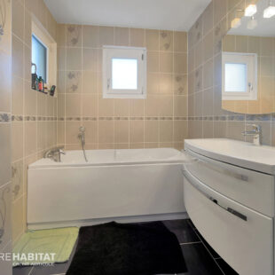 Maison individuelle 134m², 5 chambres, sous-sol complet et jardin