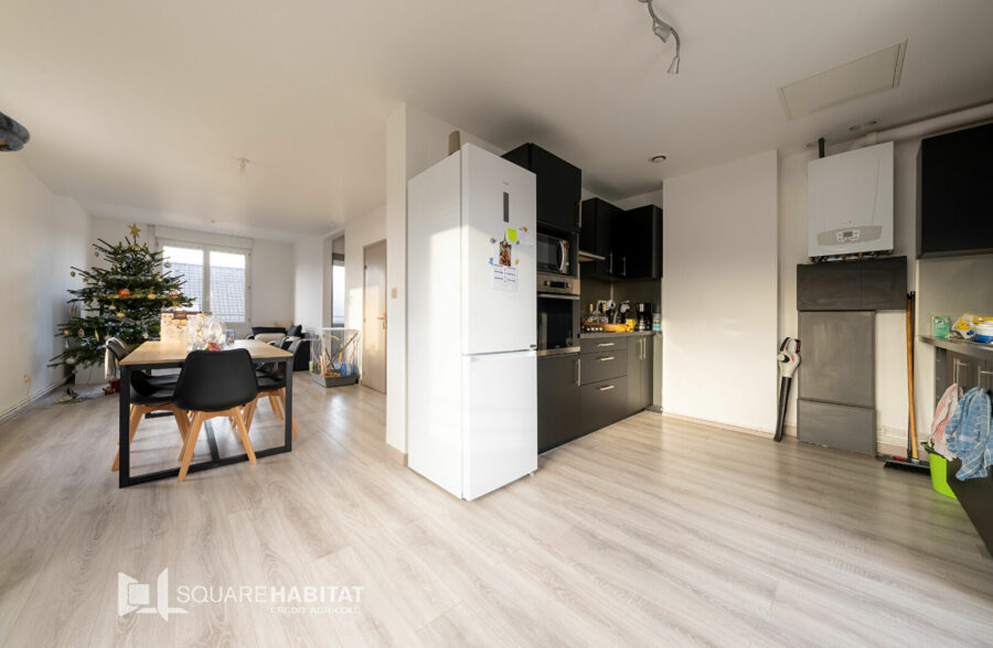 Immeuble comprenant 2 logements et garage