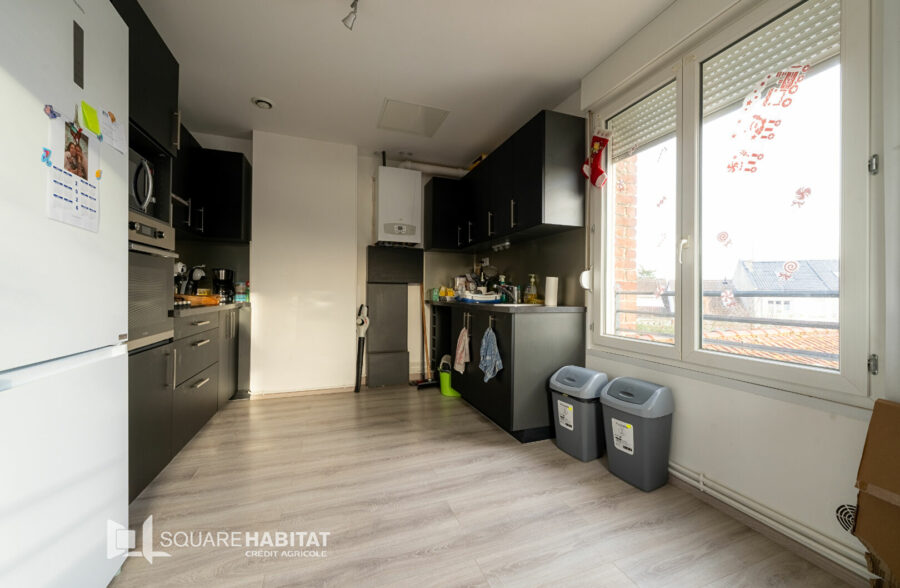 Immeuble comprenant 2 logements et garage